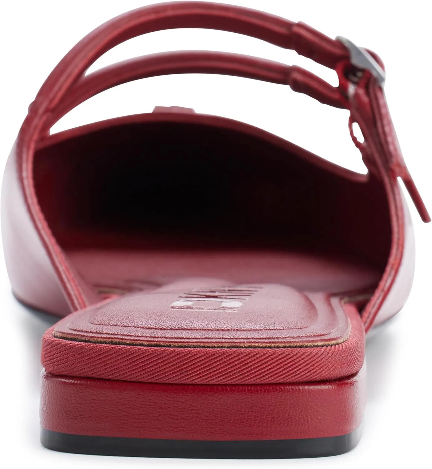 DKNY Women's Cahana Pointed Toe Flat Mule with Belt Strap Details